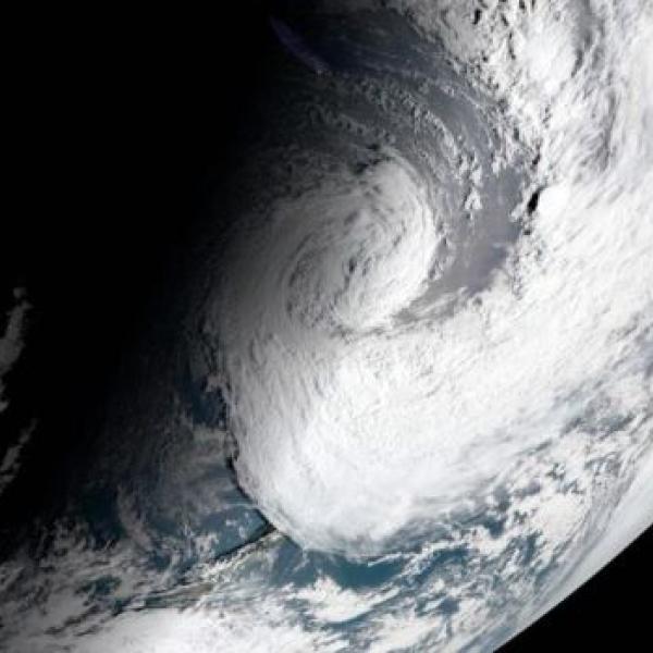 a satellite image of storm clouds forming on planet Earth