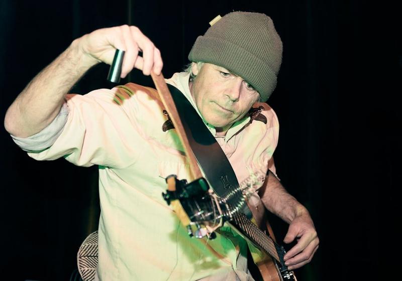 Greg playing guitar