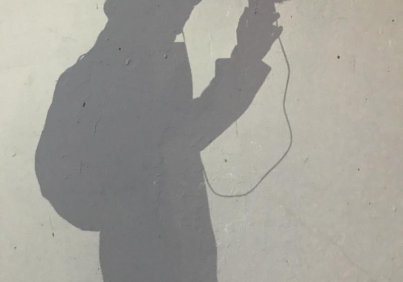 a shadow of Sam taking a field recording