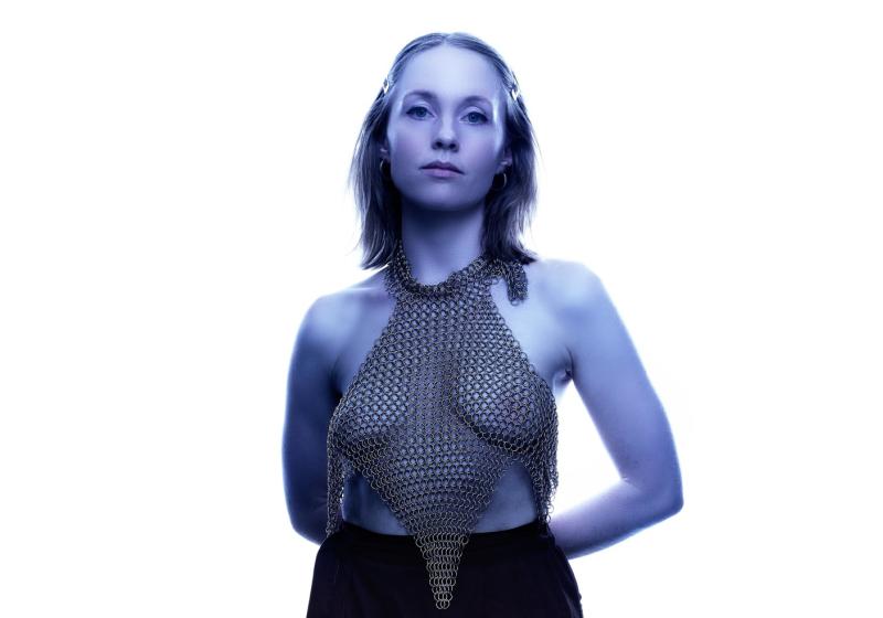 Photo of artist Flo Wilson, white background