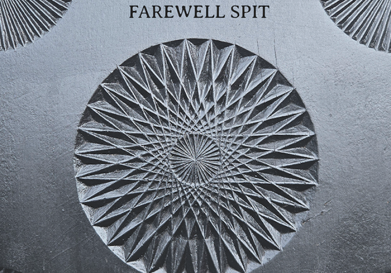 Farewell Spit poster with a geometric kaleidoscope-type circle 