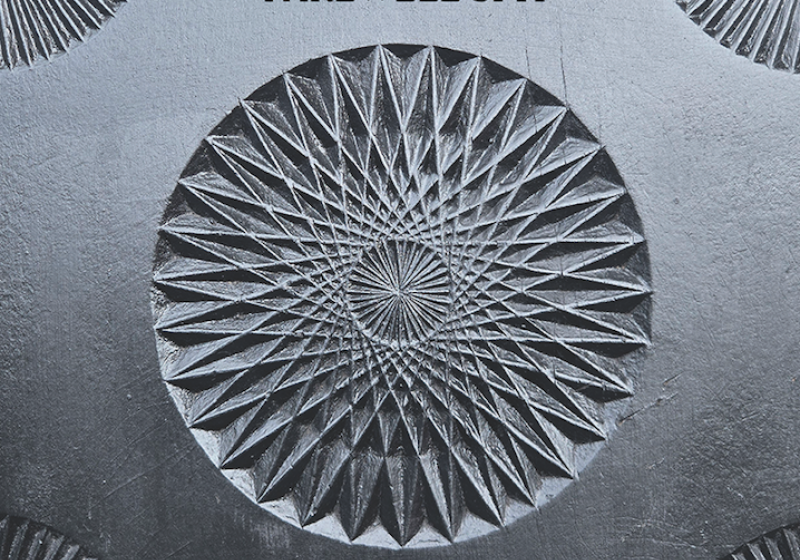 Farewell Spit poster with a geometric kaleidoscope-type circle 