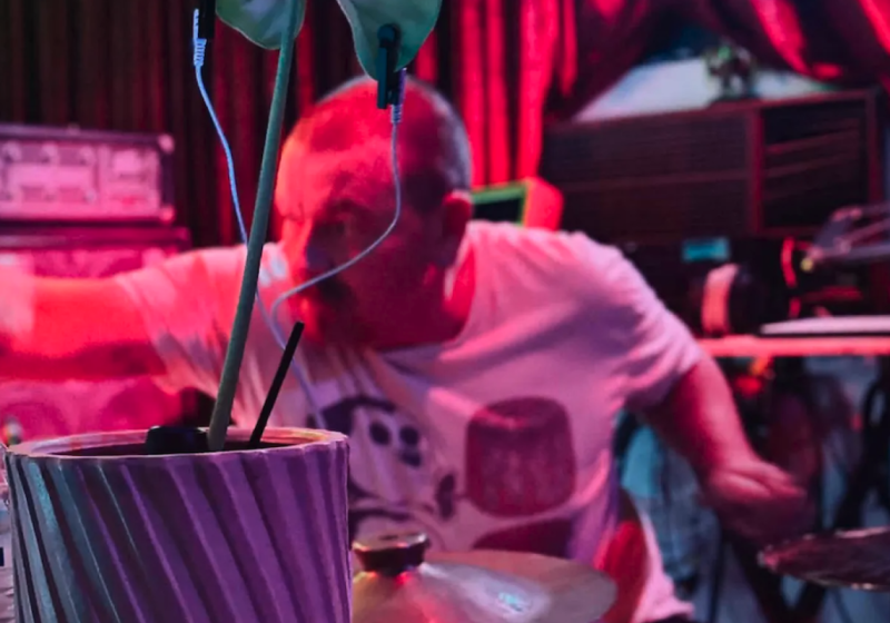 Kieran Monaghan playing drums