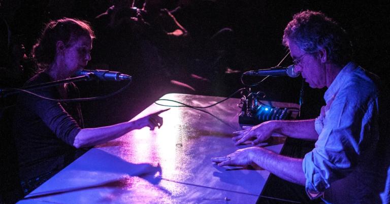 A photo of Petra Dubach & Mario van Horrik playing an amplified table