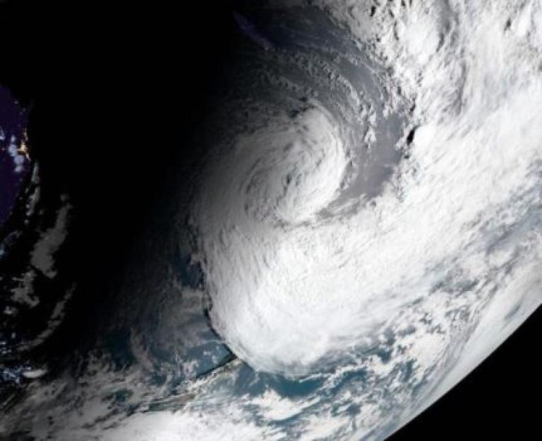 a satellite image of storm clouds forming on planet Earth