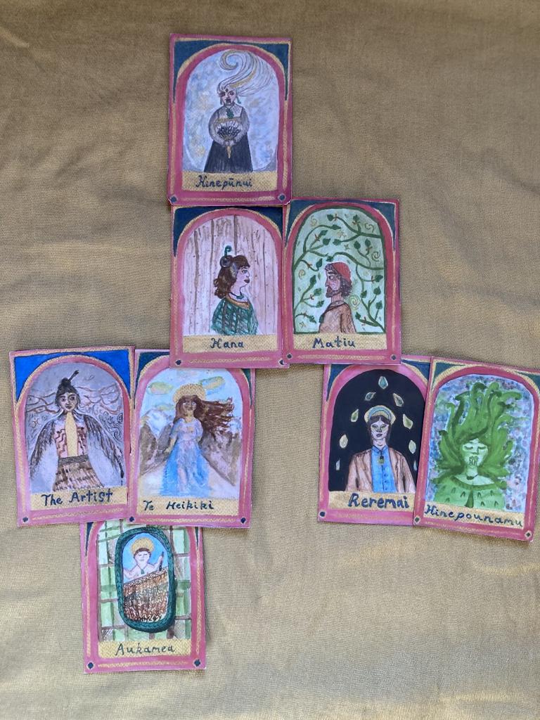 Character cards. The portraits are almots tarot like with backgrounds that tell us something of the qualities of the person depicted. 