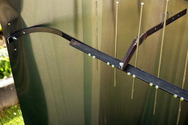 The tines being held upright in the manner described above.