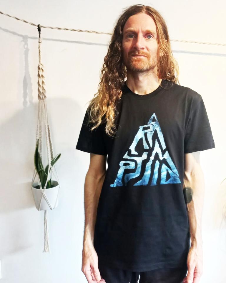 Thomas modelling a T-shirt