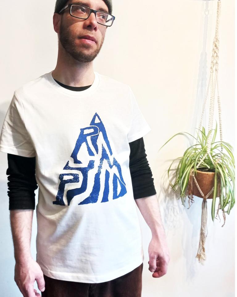 Isaac modelling a t-shirt